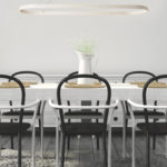 white dining table with black chairs